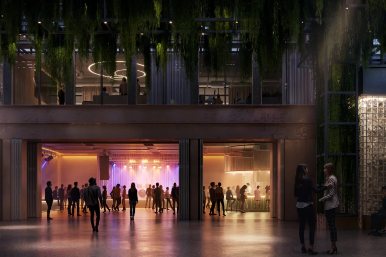Nacht-Rendering des belebten Amphitheaters mit Bühnenshow, Besuchern und modernem Lichtdesign.