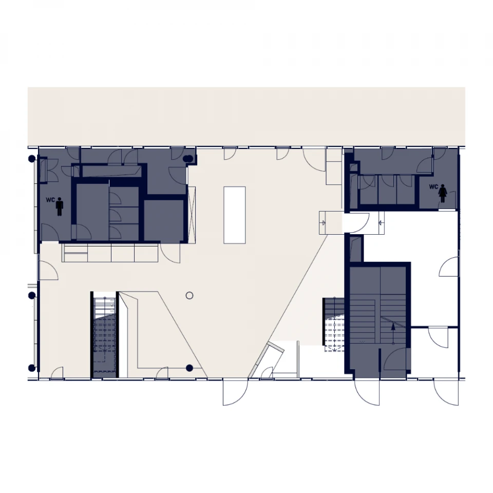 Grundriss des Erdgeschosses des Smartcafés mit eingezeichneten Räumen, Eingängen, Treppenhäusern und WC-Bereichen.